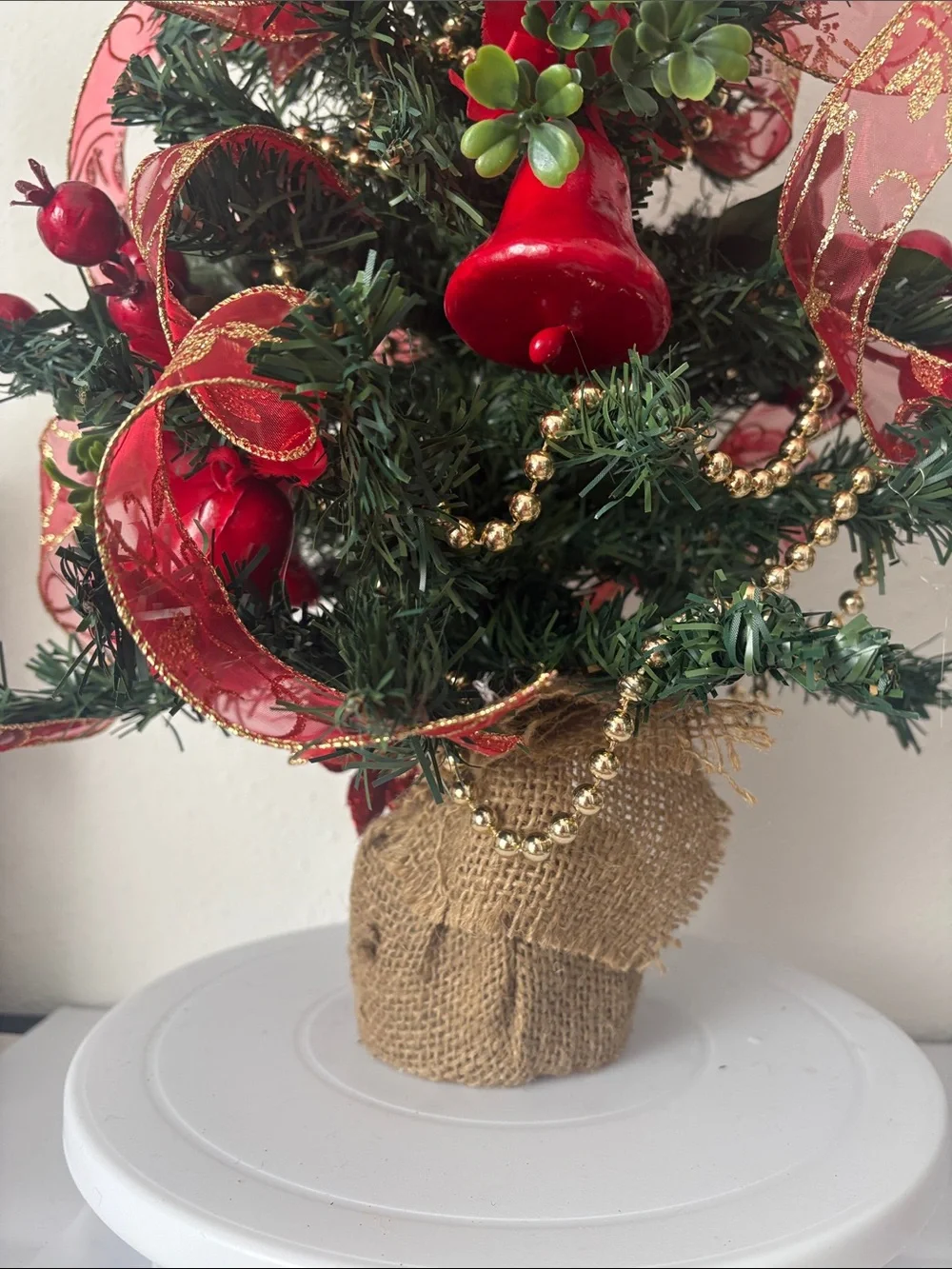 Decorative Holiday Tree with Red Ribbon and Bells